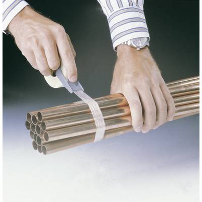 A person is cutting plastic banding from a bundle of copper pipes using a utility knife. Focus on hands and pipes.