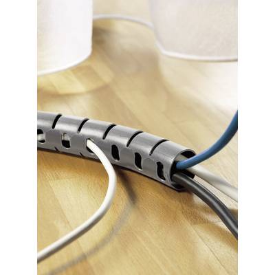 Cable management system on a wooden table: A grey cable sleeve organises white, black, and blue cables.