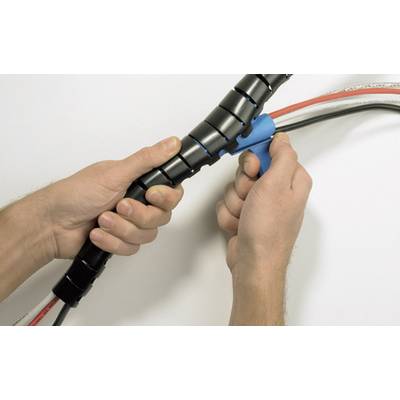 'Two hands are using a blue tool to organise cables in a black cable protection sleeve.'