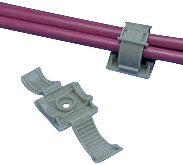 A grey cable clip holds red cables, with an opened clip lying beside it. Safety, organisation.