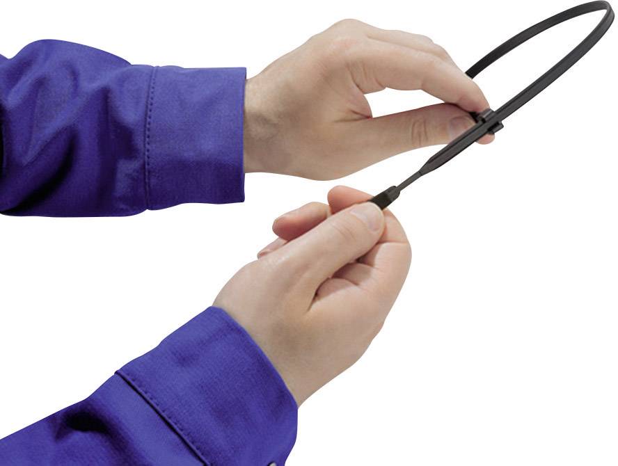 A person in blue clothing is holding a black cable or loop, as if they are about to knot or tighten it.