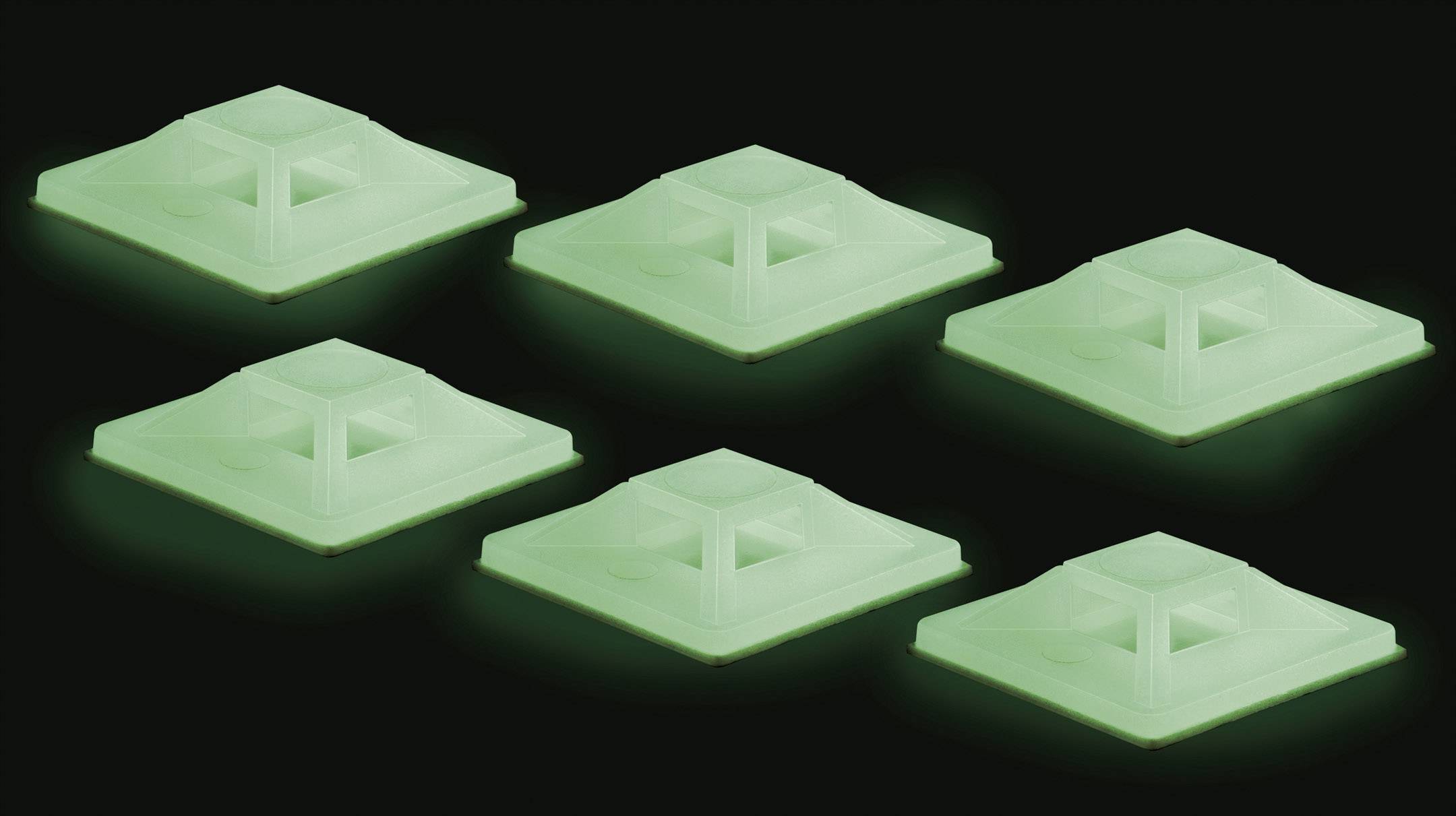 Six greenish glowing, pyramid-shaped objects on a black background.