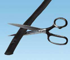 A pair of scissors cuts through a black hose against a blue background.
