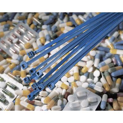 A blue cable tie lies on a variety of colourful pills and tablet blister packs.