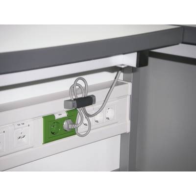 A desk with a multi-socket extension lead underneath. Various power sockets and USB ports are visible. A cable is plugged in.
