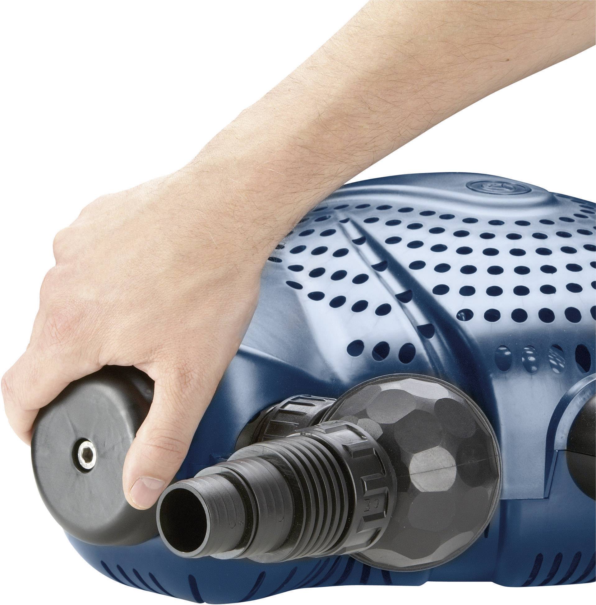 A hand is holding a blue water pump with multiple connections.