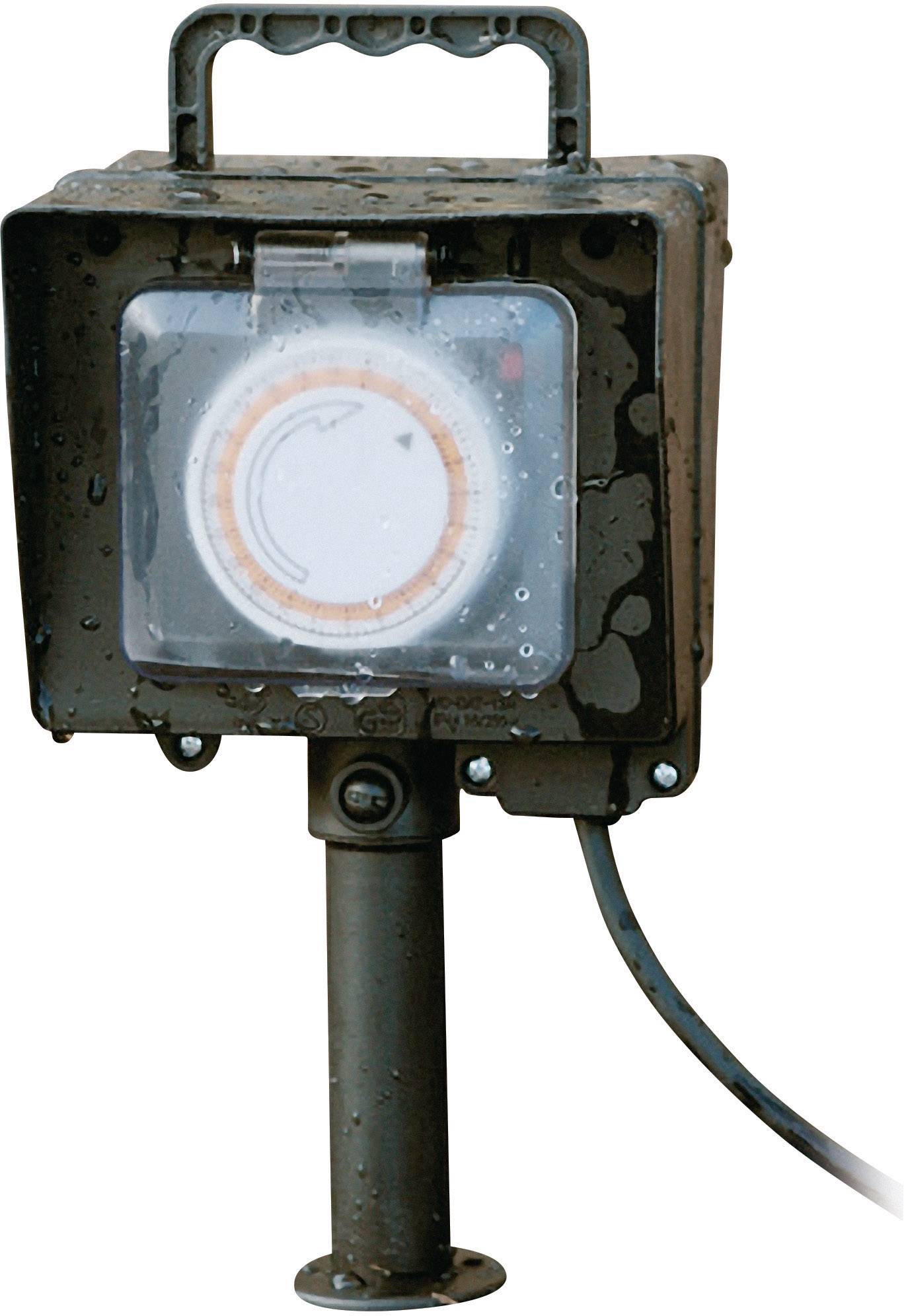 Metal cabinet with a transparent window displays a manual timer. Mounted on a stand with an electrical cable.