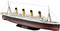 A detailed model of the RMS Titanic, depicting a large passenger ship with four funnels, placed on a black base.
