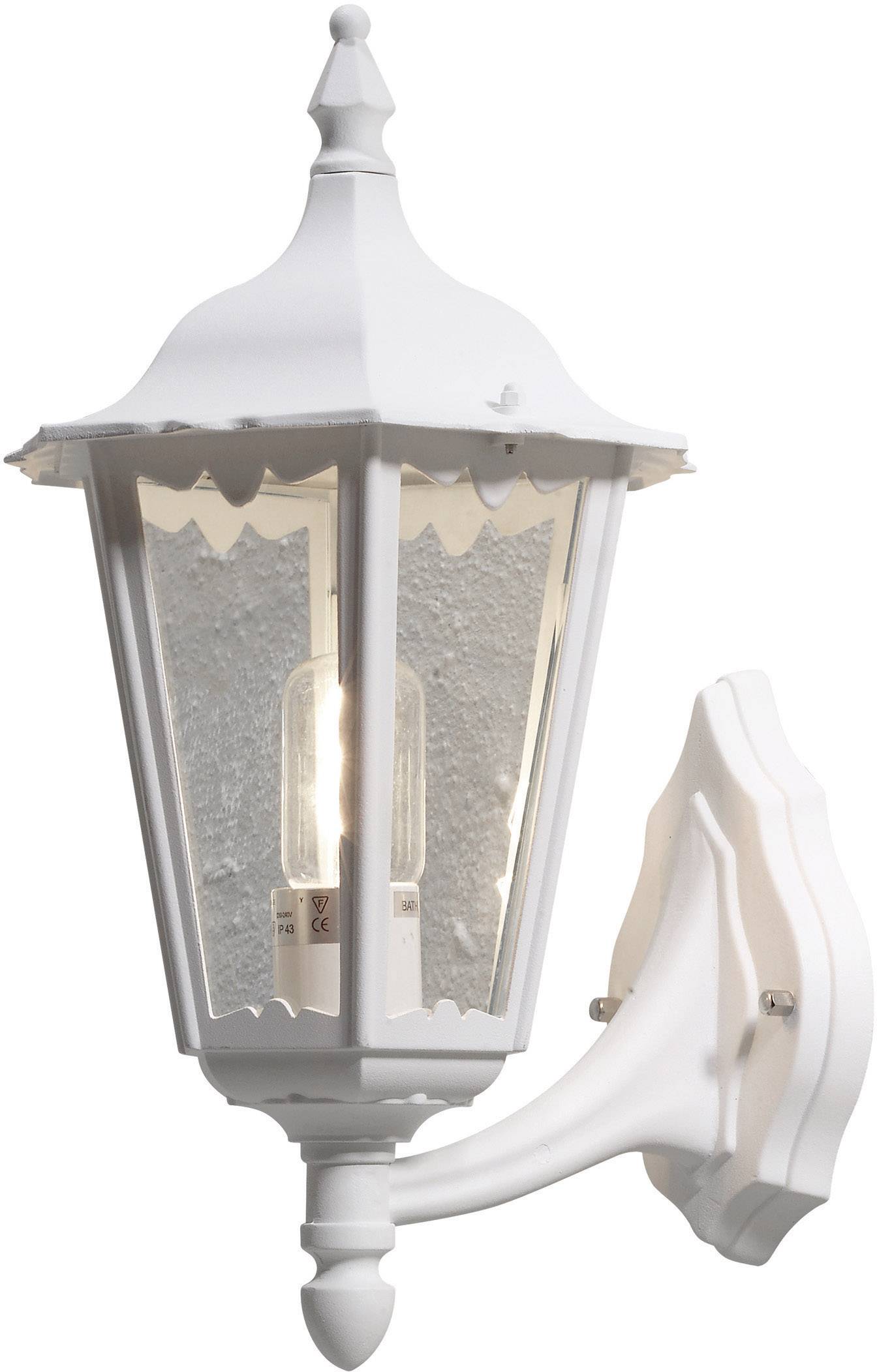 White exterior wall light with clear glass panels surrounding an upright light bulb, mounted on decorative wall brackets.