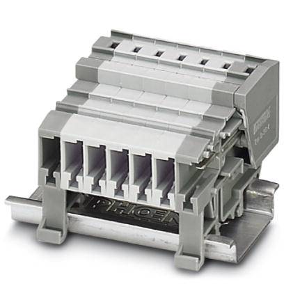 Grey-white, multi-layered electrical terminal housing made of plastic on a metal rail, with five connection points visible.