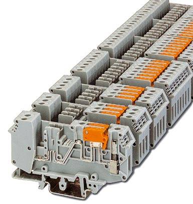 Terminal block with multi-level connections for wiring electrical circuits, grey with orange elements.
