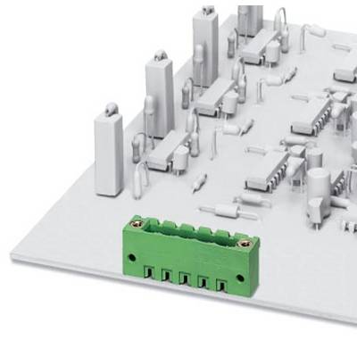 Green crocodile clip on a white circuit board, surrounded by small electronic components.