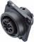 Black, round wall socket with four openings, marked with 'S 694 - 380V - 25A'. Suitable for industrial applications.