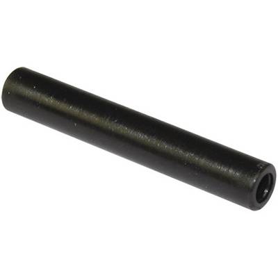 A black, cylindrical metal pin lies diagonally, pointing from bottom left to top right.