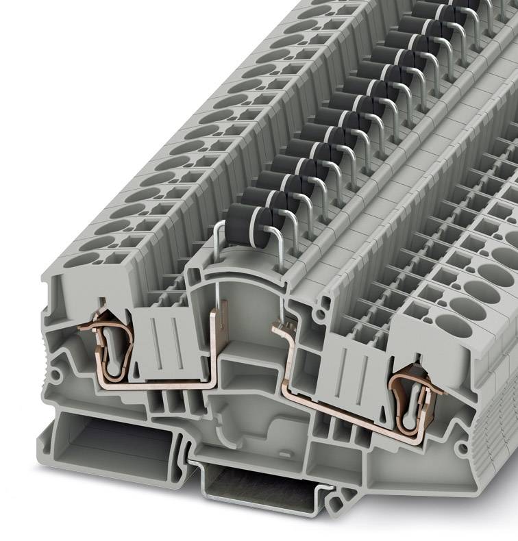 Grey plastic connection block with visible metallic terminals and connectors, used for electrical wiring.
