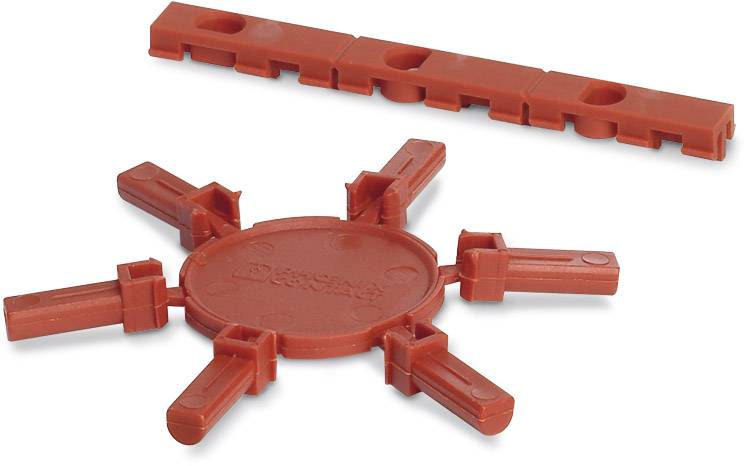 Red plastic positioning component for construction sites with six radial arms and a longitudinal connection. Usage description