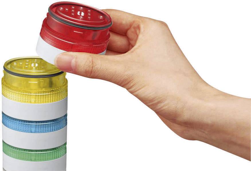 A hand holds a red LED light over a stack of yellow, blue, and green lights.