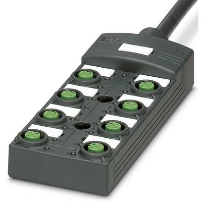 A black electronic connection block with multiple green sockets and white labels to mark the connections.