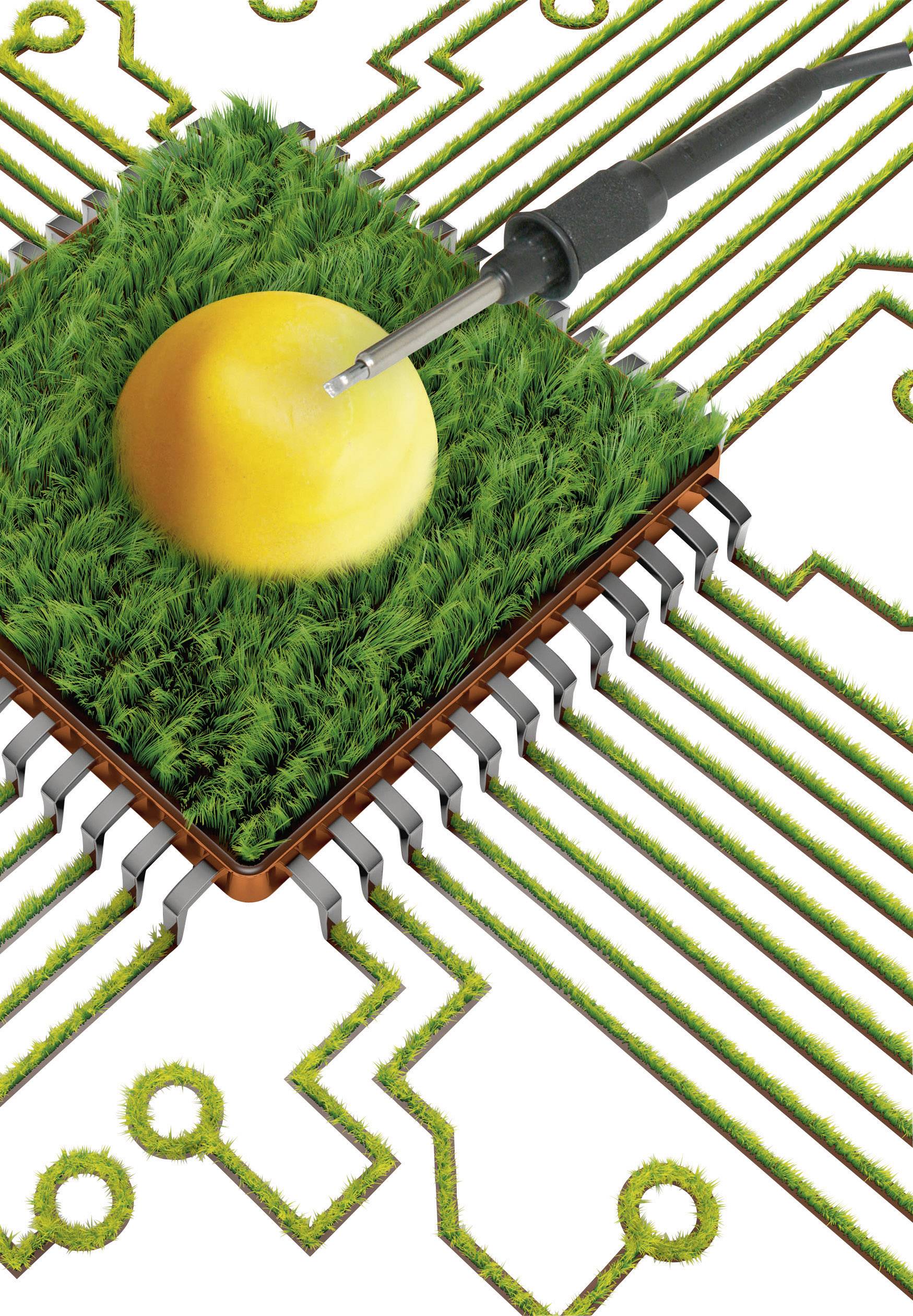 A microchip with a green, grass-like coating, upon which a yellow egg rests, is touched by a soldering iron.