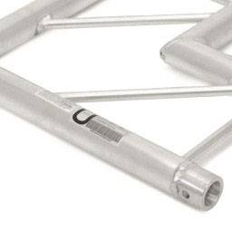 Close-up of a silver metal frame with rounded corners and connecting pieces, commonly used in scaffolding.