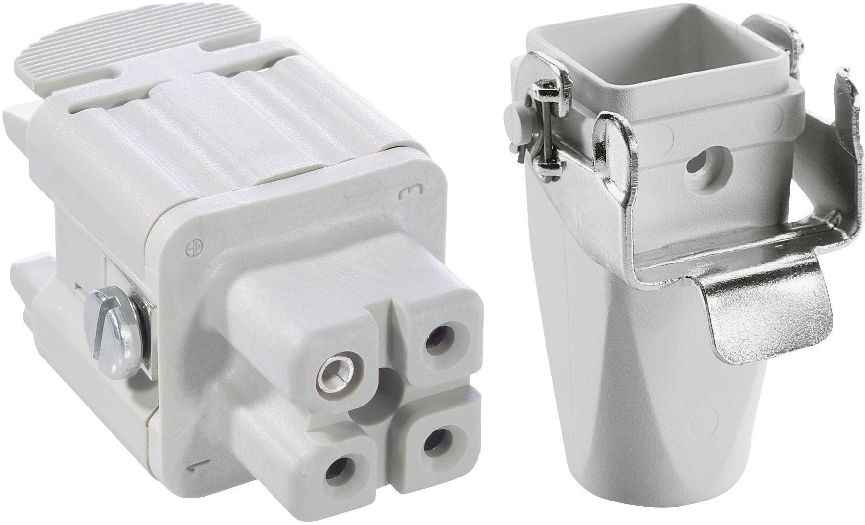 A grey electrical plug and socket positioned side by side. The plug has three holes and the socket features a metallic cover.