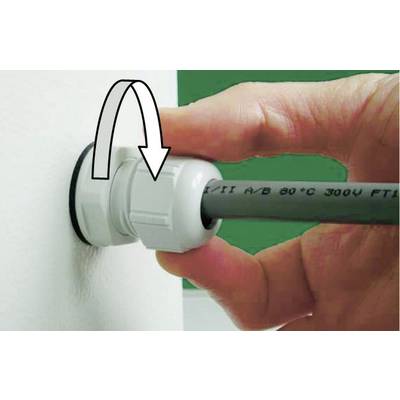 A hand pulls a cable through a white screw connection in the wall. An arrow indicates the direction of rotation for tightening. A plastic clamp secures the cable.
