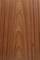 Wood grain with a symmetrical, reddish-brown pattern reminiscent of natural wood surfaces.