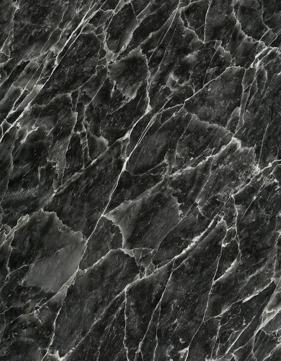 Black marble surface with white veins running diagonally.