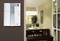 Intercom mounted on a wall, with a blurred view of a dining room with a table and chairs in the background.