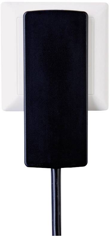 Black plug with cable inserted into white electrical socket.