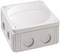 Grey electrical junction box with multiple inlets and a screwed lid, suitable for cable connections.