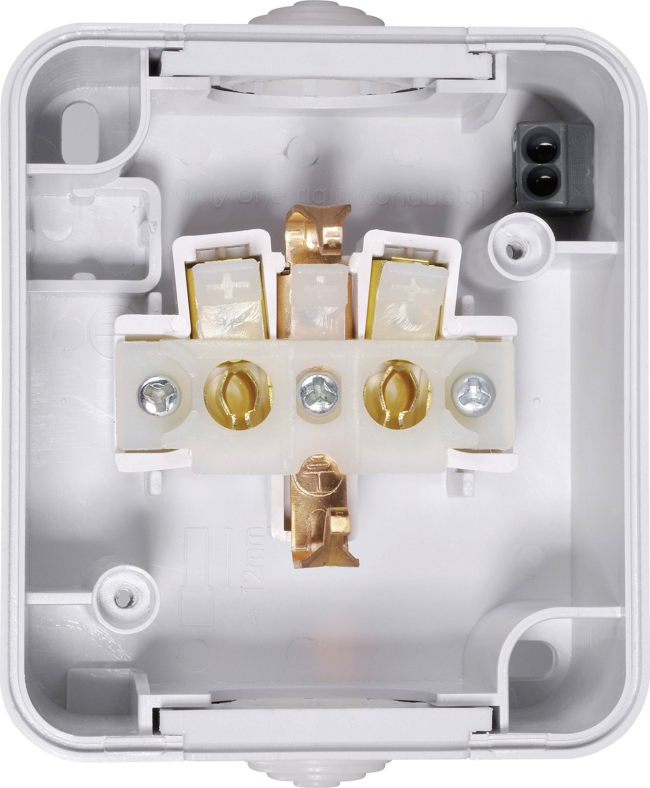 Electrical socket with three terminals, screw fixings and cable guides, suitable for wiring household appliances.