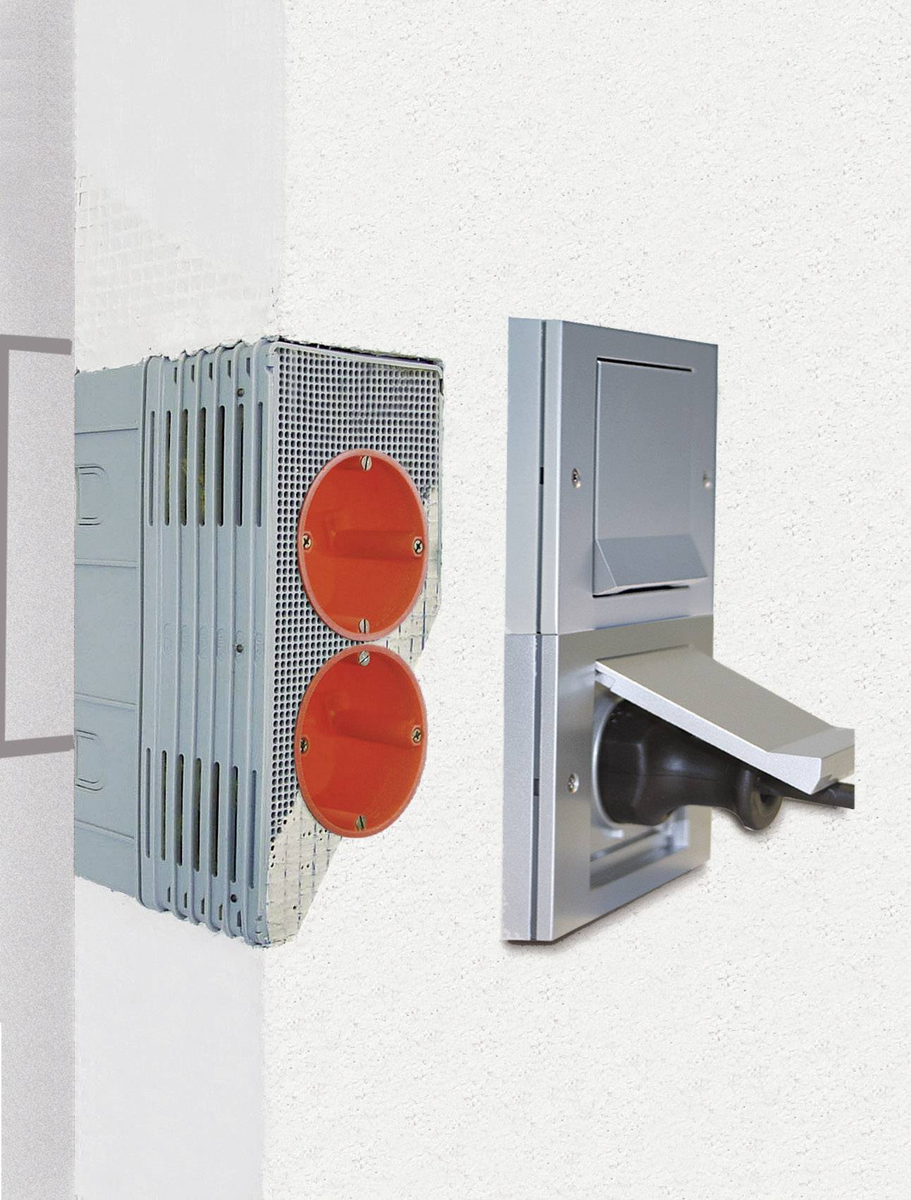 A sound-insulating ventilation unit can be seen installed in a wall, with a cover on the front and two ventilation pipes.