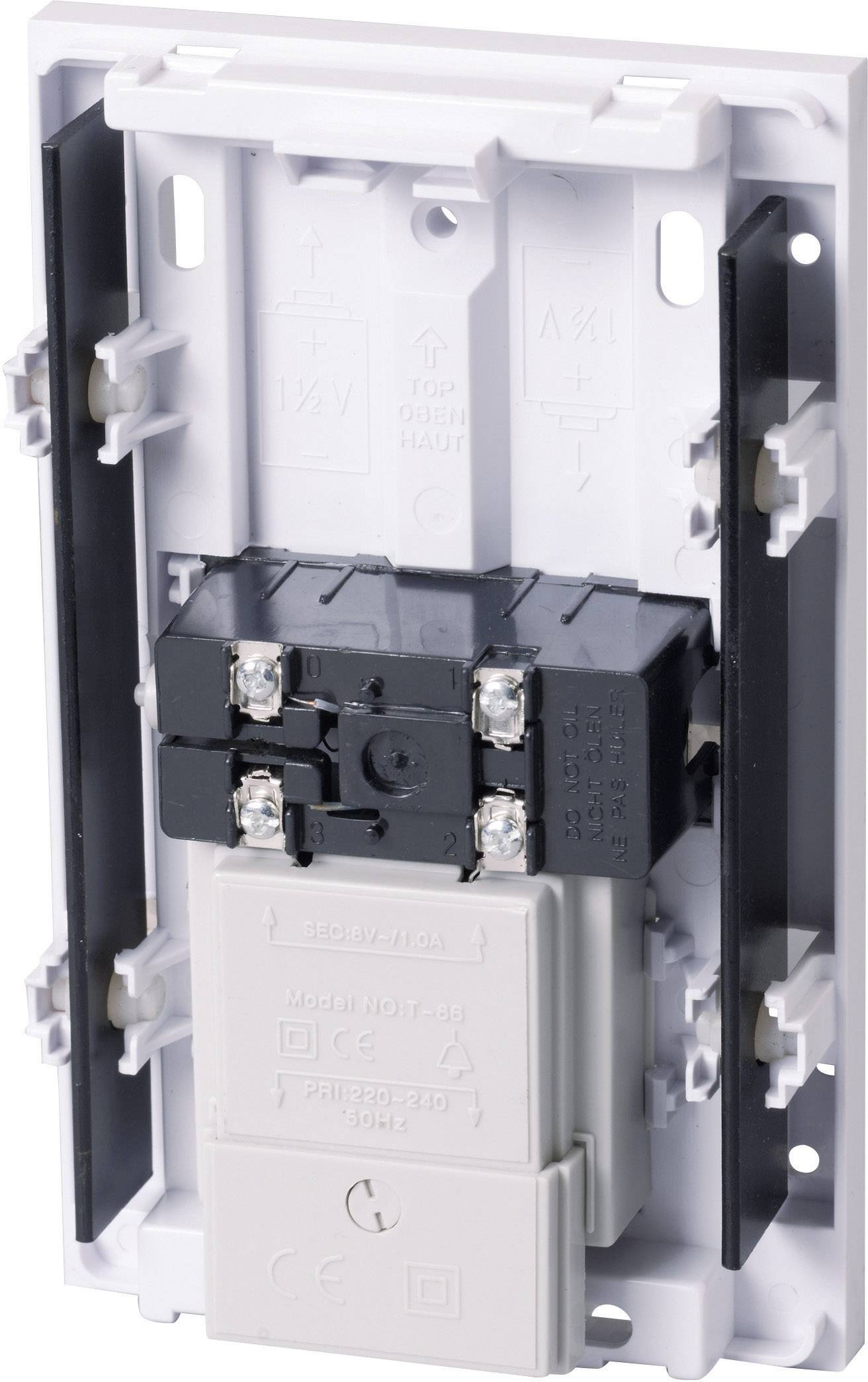 Electric switch without cover, showing internal mechanisms with visible screws and connections.