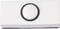 A white door handle with a round black circle in the centre, rectangular in shape.
