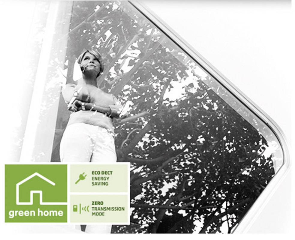 A person gazes out of a modern window, surrounded by trees. A symbol displays 'green home', 'Eco DECT Energy Saving', 'Zero Transmission Mode'.