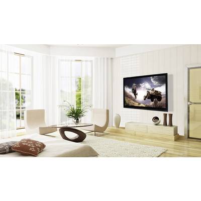 Large, modern living room with light wooden flooring. A flat-screen television is mounted on the wall, displaying a landscape scene with vehicles.