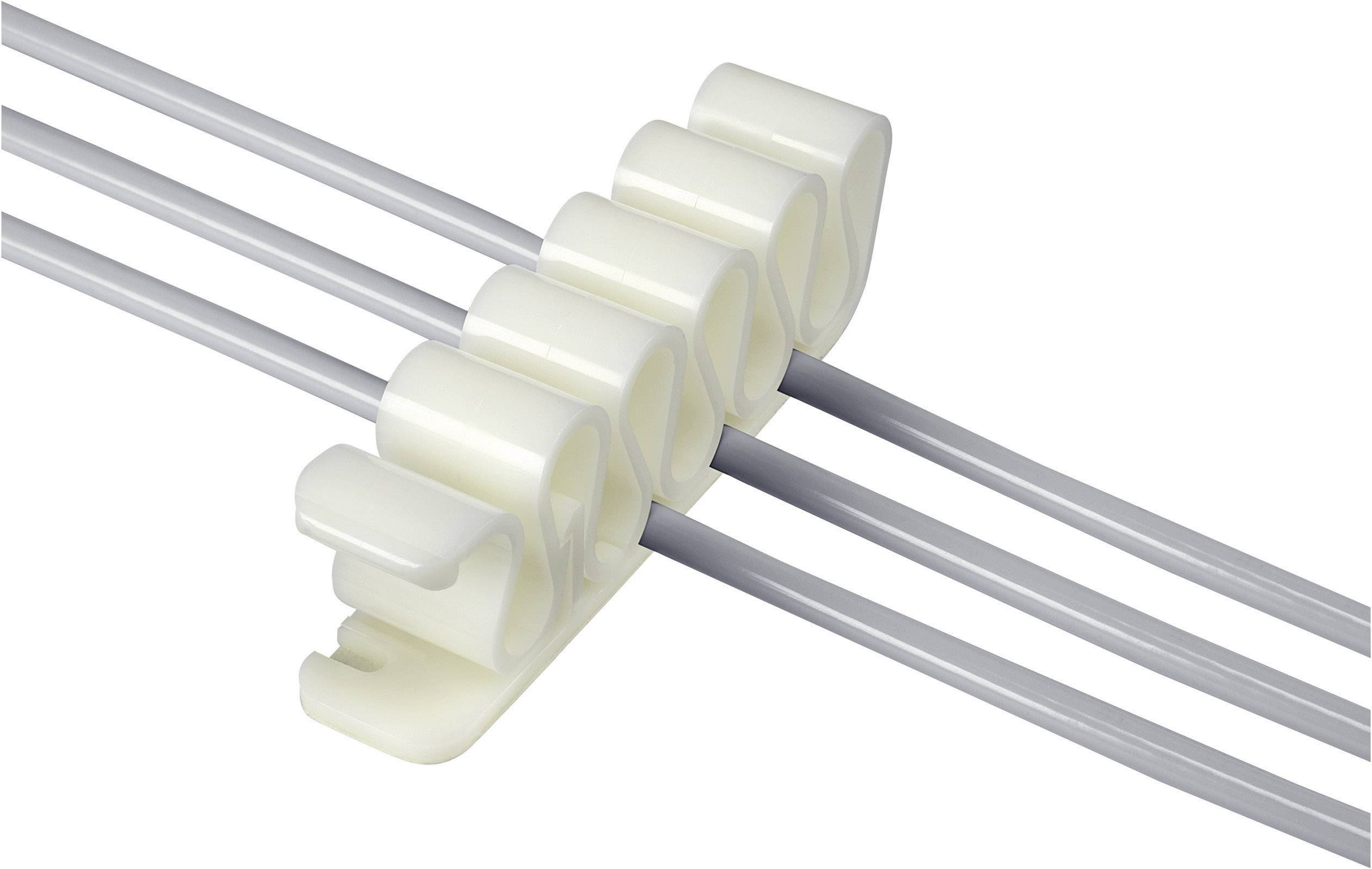 Cable holder with four parallel-running cables in a white, curved clip.