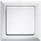 A white light switch on a flat, neutral surface. The switch is square and has a simple, modern design.