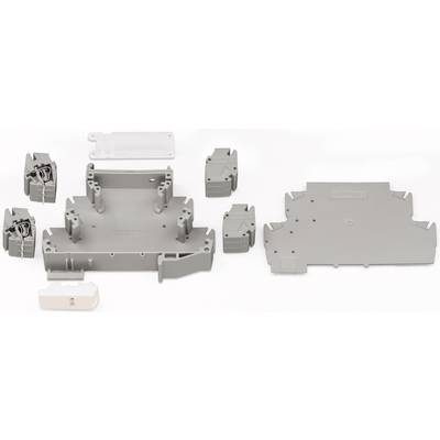 Grey plastic components on a white background. Various shapes and sizes, potentially parts of a device or enclosure.
