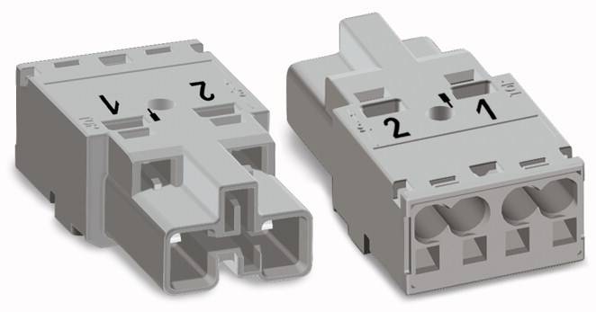 Two grey electrical plastic connectors, with marked numbers and letters to identify the connections.