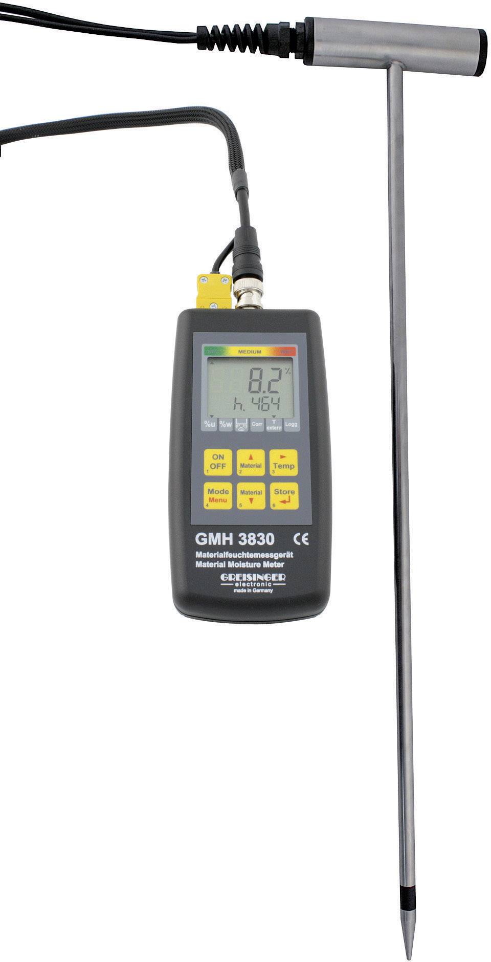 A digital measuring device with a display shows 8.2. It is connected to a long sensor probe. Marked with 'GMH 3830'.