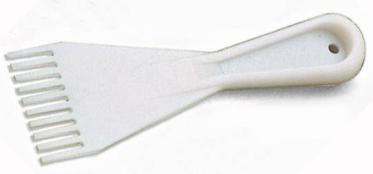 A white plastic tile scraper with eight serrated teeth and an ergonomic handle, suitable for removing adhesive residue.