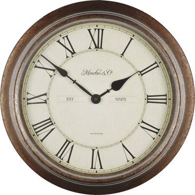 Round wall clock with Roman numerals and two hands. Marked with 'Moreton & Co' and 'EST MMIX'. Wooden frame and beige dial. Showing 10:10.