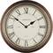 Round wall clock with Roman numerals and two hands. Marked with 'Moreton & Co' and 'EST MMIX'. Wooden frame and beige dial. Showing 10:10.