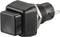 A black push switch with a rectangular button and electrical connection.