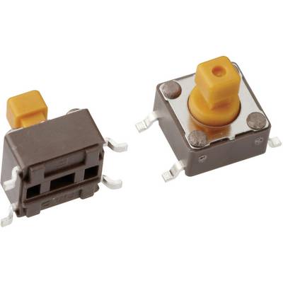 Two yellow switches with four metal connectors for electronic circuits. One is lying flat, the other is upright.
