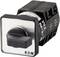 A square switch by Eaton in a black and silver casing, with a rotary knob in the centre.