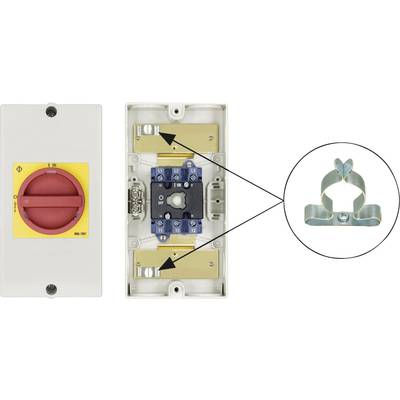 'Switching system with a red rotary switch on a yellow background, internal mechanism visible, detailed view of a metal clip on the right.'