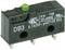 Miniature switch with green push button, Model DB3, for electrical control systems, labelled with specifications and current capacity.